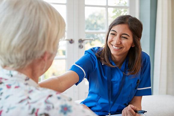 carer talking with lady